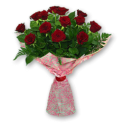 Bouquet of red roses (60 cm.) decorated with verdure
