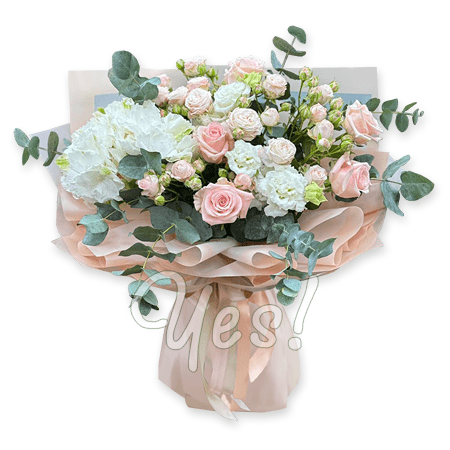 A bouquet of hydrangeas, bush roses and lisianthus.