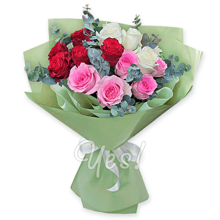 A bouquet of red, white, and pink roses accented with eucalyptus